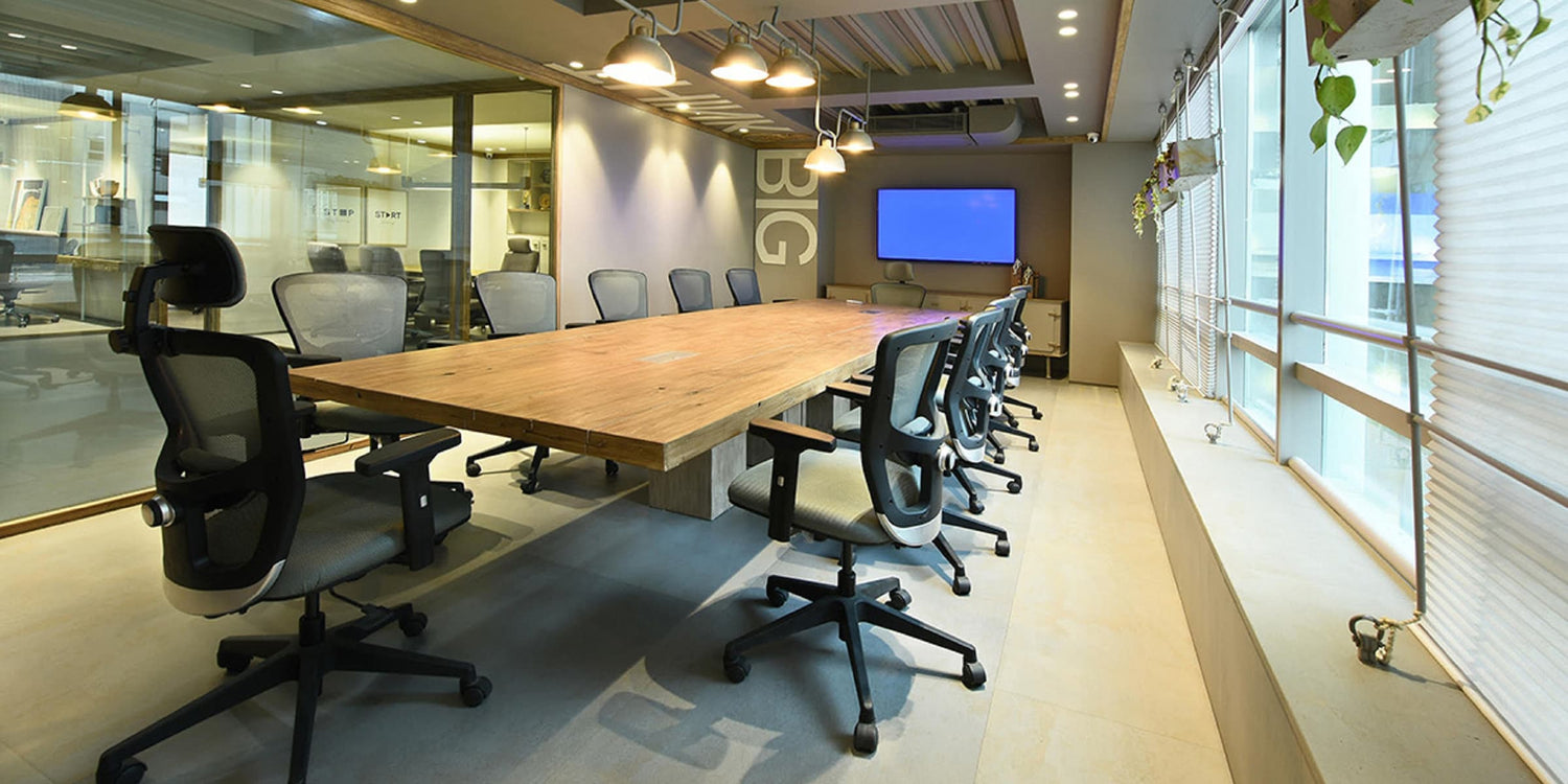Office with long table and chairs