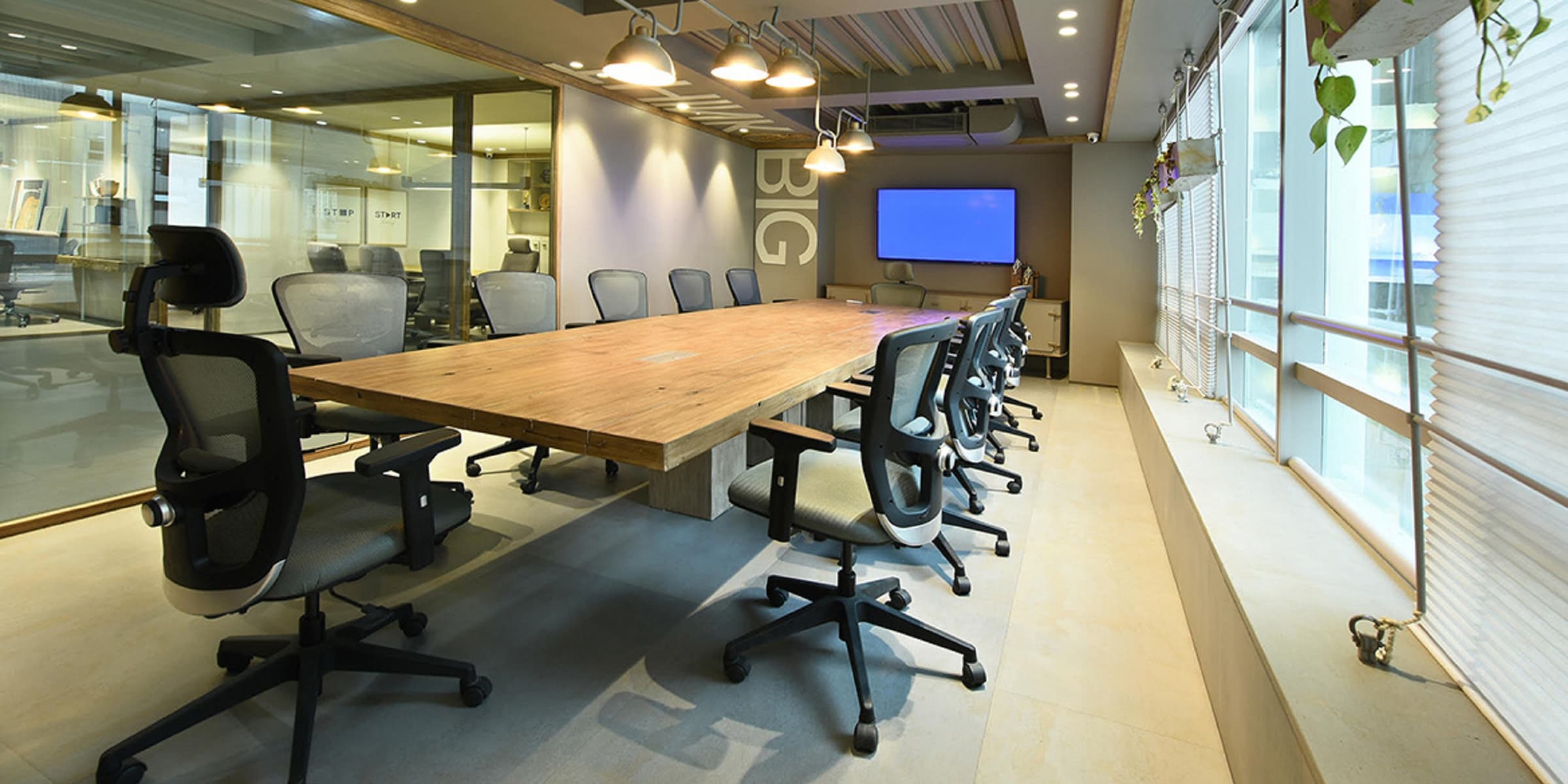 Office with long table and chairs