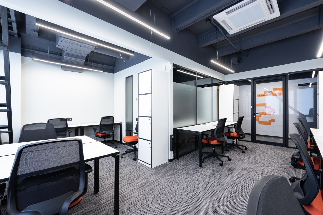 empty desks and chairs in an office