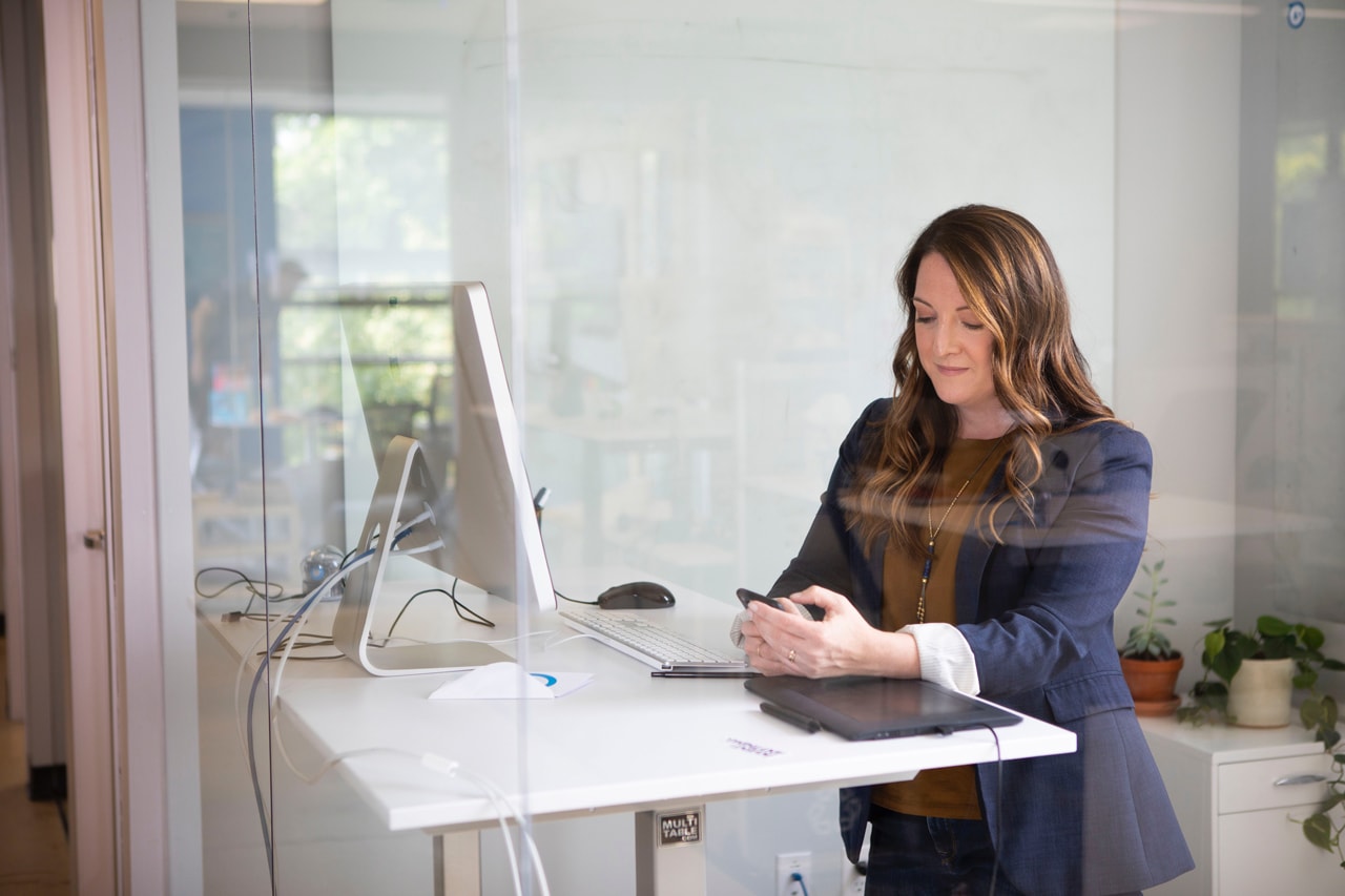 woman using standing desk