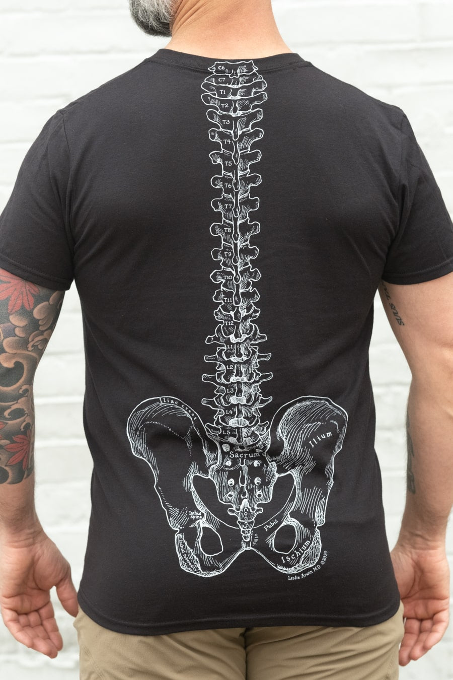 man wearing QOR360 x-ray t-shirt