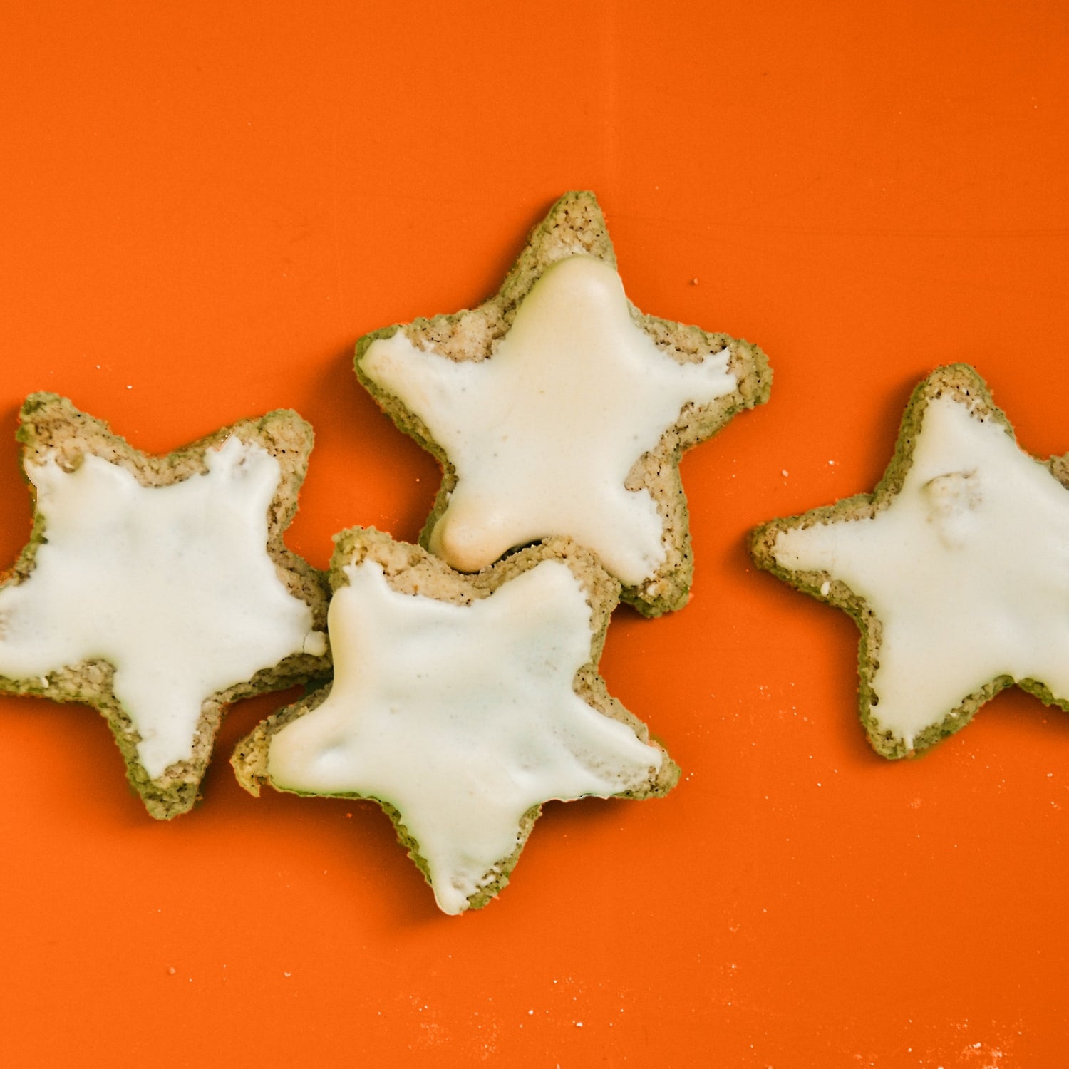 four cookies shaped liked stars