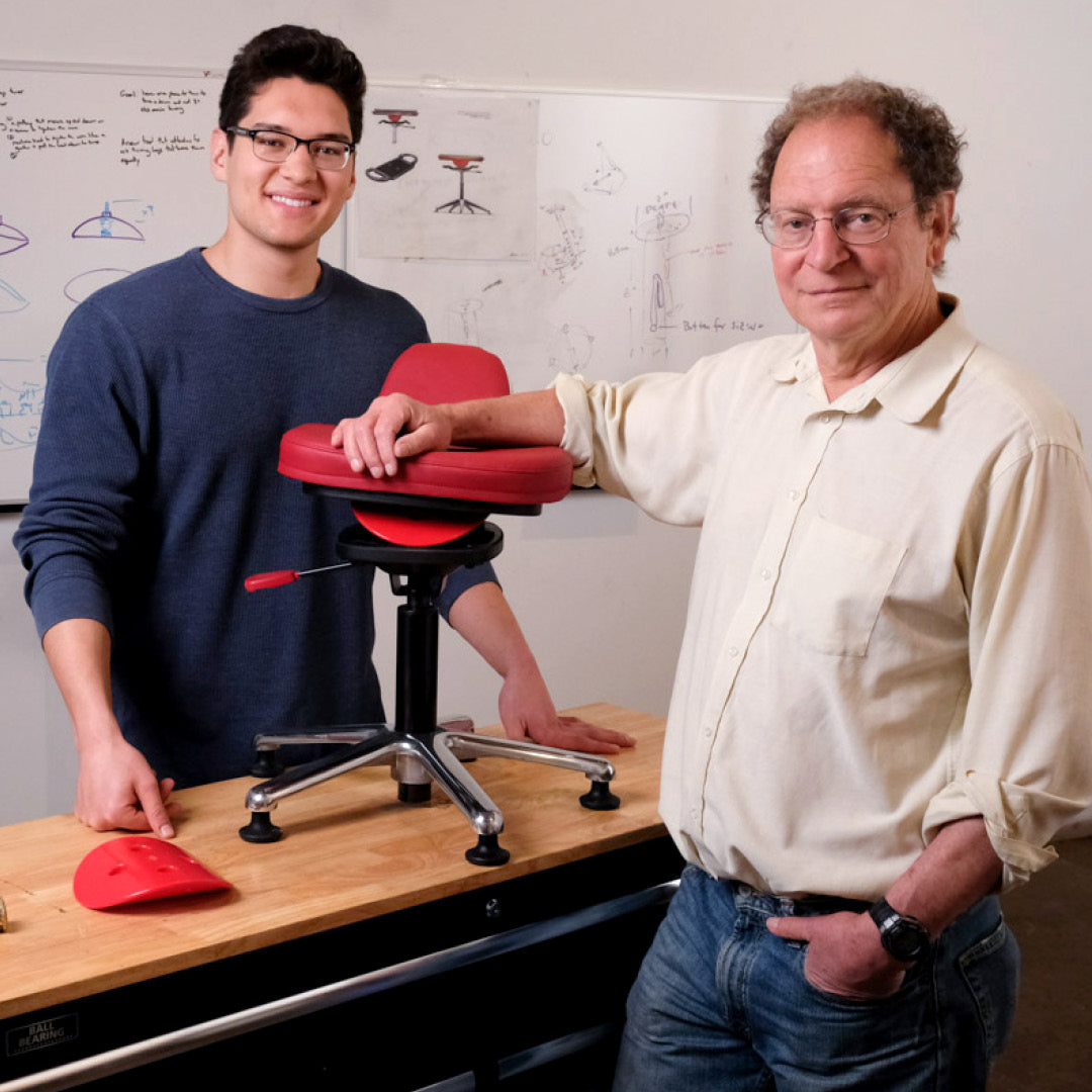 Dr. Turner Osler with a colleague and a QOR360 active chair